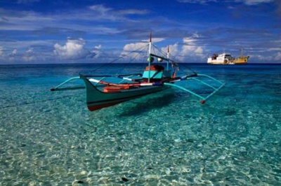 Peace and quiet: A sailing boat is moored in the waters off Miangas Island, in the Pacific, near the border with Mindano, Philippines.